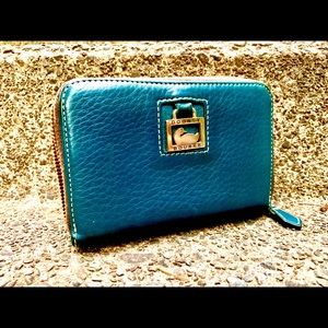 Dooney & Bourke navy blue organizer wallet.